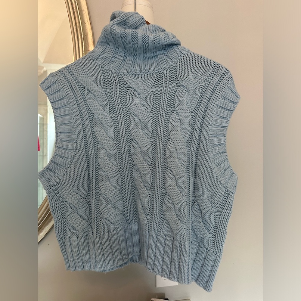 Blue turtleneck knit sweater